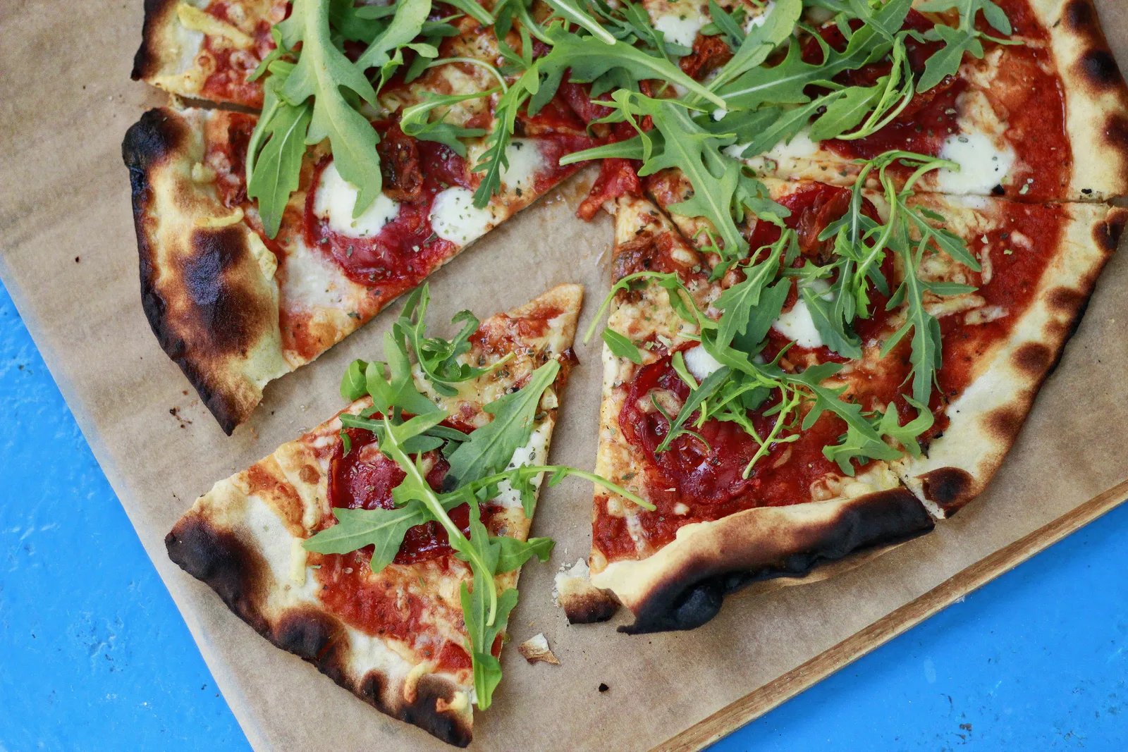 Freshly baked pizza ready to serve at Red Oven Pizza Café12
